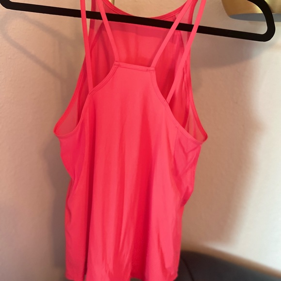 Lululemon workout top size 4. Pink/salmon color - Picture 4 of 6